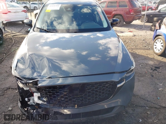 2022 Mazda CX-5 2.5 S Preferred Package with VIN JM3KFBCM1N0562277, listed as a IAAI auction lot 41421324 with 68,528 mi miles. Bid and sale history available at carsss.com. Image 12.