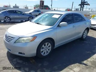 2008 Toyota Camry LE with VIN 4T1BK46K18U069959, listed as a IAAI auction lot 41690512 with 255,137 mi miles. Bid and sale history available at carsss.com. Image 2.