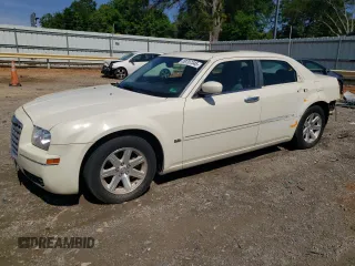 2006 Chrysler 300 Touring z VIN 2C3KA53G96H423843, wystawiony jako Copart lot #59707345 z przebiegiem 163 519 mil mil oraz Szkoda całkowita • Salvage title. Historia ofert i sprzedaży dostępna na DreamBid. Obrazek 1.