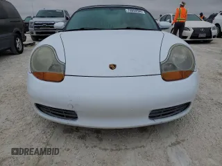 1998 Porsche Boxster с VIN WP0CA2987WU623387, выставлен на аукционе Copart как лот 76859594 с пробегом Не указан миль и Списание • Salvage title. История ставок и продаж доступна на DreamBid. Изображение 5.