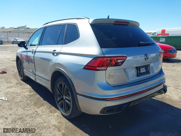 2022 Volkswagen Tiguan SE R-Line Black with VIN 3VVCB7AX4NM008121, listed as a IAAI auction lot 41671382 with 71,674 mi miles. Bid and sale history available at carsss.com. Image 3.