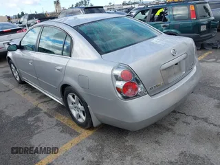2006 Nissan Altima 2.5 with VIN 1N4AL11D66N366825, listed as a IAAI auction lot 41735284 with 169,131 mi miles. Bid and sale history available at carsss.com. Image 3.