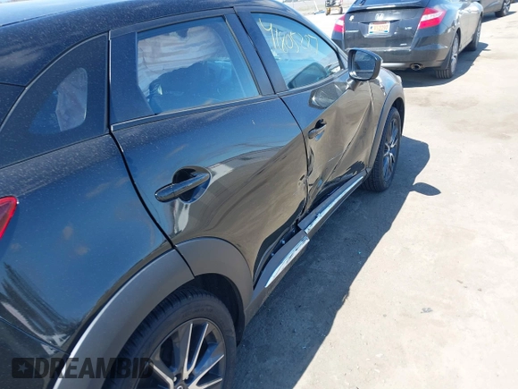 2018 Mazda CX-3 Grand Touring z VIN JM1DKFD75J0312662, wystawiony jako IAAI lot #41805287 z przebiegiem 140 083 mil mil oraz . Historia ofert i sprzedaży dostępna na DreamBid. Obrazek 6.