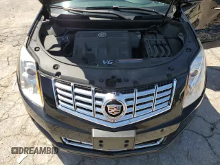2014 Cadillac SRX Luxury Collection z VIN 3GYFNEE32ES647165, wystawiony jako Copart lot #52331335 z przebiegiem 27 277 mil mil oraz Szkoda całkowita • Salvage title. Historia ofert i sprzedaży dostępna na DreamBid. Obrazek 13.