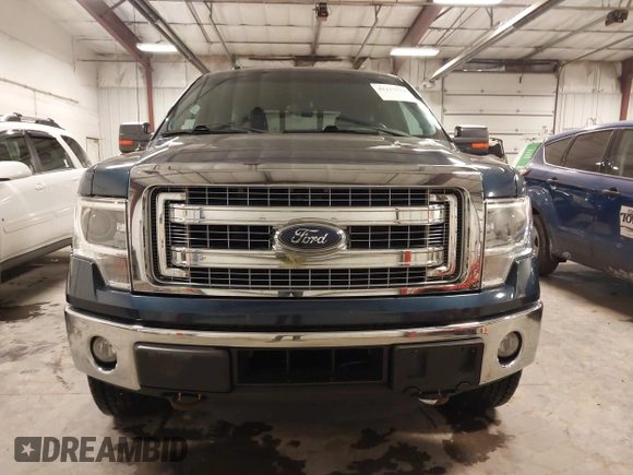 2014 Ford F-150 XL with VIN 1FTFW1ET1EKD06590, listed as a IAAI auction lot 41217519 with 155,792 mi miles and . Bid and sale history available at DreamBid. Image 13.