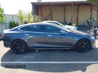 2017 Tesla Model S 100D with VIN 5YJSA1E49HF189008, listed as a IAAI auction lot 42051518 with 49,145 mi miles and . Bid and sale history available at DreamBid. Image 14.