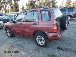 1999 Suzuki Vitara JX z VIN 2S3TD52V6X6101702, wystawiony jako Copart lot #42596125 z przebiegiem 225 614 mil mil oraz Tytuł czysty. Historia ofert i sprzedaży dostępna na DreamBid. Obrazek 2.