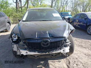 2014 Mazda CX-5 Touring z VIN JM3KE4CY4E0328880, wystawiony jako IAAI lot #42112302 z przebiegiem 185 228 mil mil oraz . Historia ofert i sprzedaży dostępna na DreamBid. Obrazek 13.