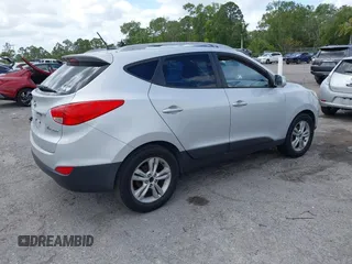 2010 Hyundai Tucson GLS with VIN KM8JU3AC0AU019205, listed as a IAAI auction lot 42157796 with 175,246 mi miles and . Bid and sale history available at DreamBid. Image 4.