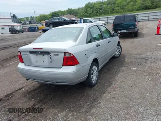 2007 Ford Focus S with VIN 1FAFP34N07W141693, listed as a IAAI auction lot 42310938 with 150,489 mi miles and . Bid and sale history available at DreamBid. Image 4.