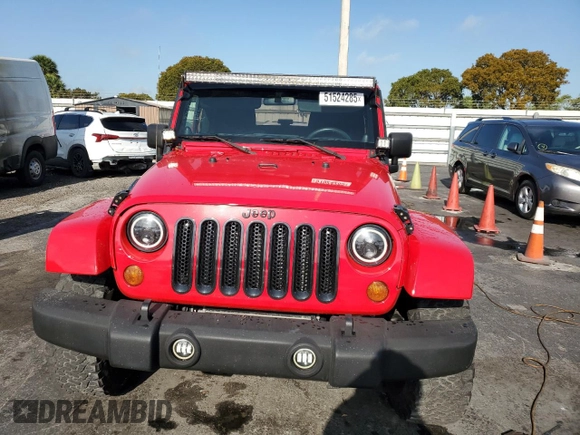 2011 Jeep Wrangler Sport with VIN 1J4AA2D17BL628066, listed as a Copart auction lot 51524285 with 105,854 mi miles and Clean Title. Bid and sale history available at carsss.com. Image 5.