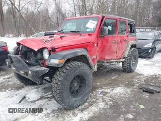 2018 Jeep Wrangler Unlimited Sport S with VIN 1C4HJXDG5JW131522, listed as a IAAI auction lot 41563099 with 75,405 mi miles and . Bid and sale history available at DreamBid. Image 2.