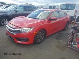 2018 Honda Civic EX with VIN 2HGFC2F74JH530701, listed as a Copart auction lot 74676554 with 69,624 mi miles and Salvage Title. Bid and sale history available at DreamBid. Image 1.