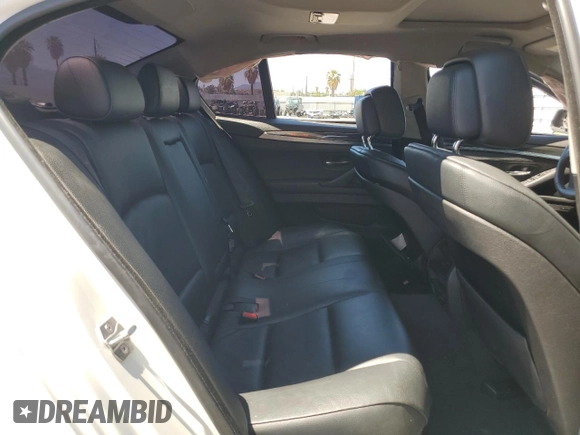 2013 BMW 5 Series 535i with VIN WBAFR7C56DC823291, listed as a Copart auction lot 56621415 with 100,423 mi miles and Salvage title. Bid and sale history available at DreamBid. Image 10.