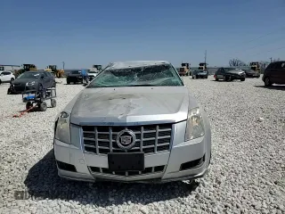 2013 Cadillac CTS Luxury с VIN 1G6DE5E52D0148566, выставлен на аукционе Copart как лот 52803415 с пробегом 110 866 миль миль и Списание • Salvage title. История ставок и продаж доступна на DreamBid. Изображение 10.