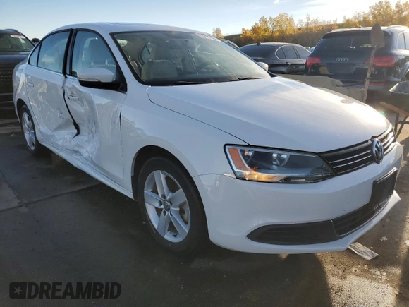 2014 Volkswagen Jetta TDI w/Premium with VIN 3VW3L7AJ4EM390185, listed as a Copart auction lot 76391084 with 49,897 mi miles and Salvage title. Bid and sale history available at DreamBid. Image 4.
