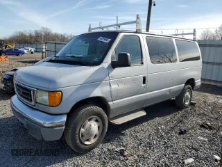 2005 Ford Econoline Passenger XL with VIN 1FBNE31LX5HA76002, listed as a Copart auction lot 43599865 with 198,749 mi miles and Salvage Title. Bid and sale history available at carsss.com. Image 1.