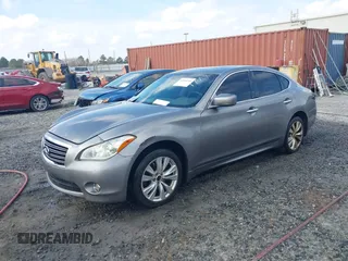 2011 Infiniti M with VIN JN1BY1AR2BM374001, listed as a IAAI auction lot 41544244 with 235,343 mi miles and . Bid and sale history available at DreamBid. Image 2.