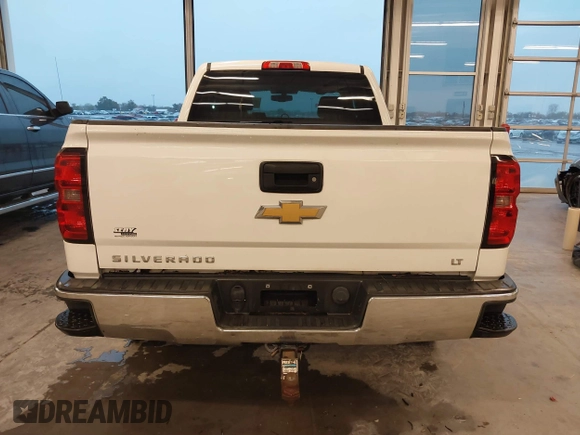 2014 Chevrolet Silverado 1500 LT with VIN 1GCVKREC3EZ106310, listed as a IAAI auction lot 40752259 with 162,397 mi miles and . Bid and sale history available at DreamBid. Image 17.