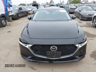 2021 Mazda 3 Premium with VIN JM1BPADL4M1329041, listed as a IAAI auction lot 42291604 with 93,248 mi miles and . Bid and sale history available at DreamBid. Image 13.