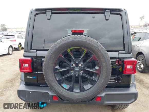 2023 Jeep Wrangler Sahara z VIN 1C4JJXP6XPW556327, wystawiony jako IAAI lot #41784532 z przebiegiem 39 918 mil mil oraz . Historia ofert i sprzedaży dostępna na DreamBid. Obrazek 16.