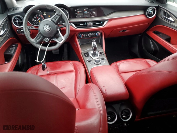 2021 Alfa Romeo Stelvio Ti with VIN ZASPAKBN9M7D20776, listed as a Copart auction lot 43731165 with 63,995 mi miles and Salvage Title. Bid and sale history available at carsss.com. Image 8.