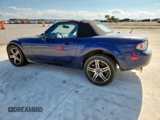 2007 Mazda MX-5 Miata Touring with VIN JM1NC25F770138120, listed as a Copart auction lot 60777425 with 184,029 mi miles and Salvage title. Bid and sale history available at DreamBid. Image 2.
