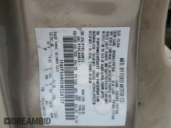 2005 Ford Focus S with VIN 1FAFP34N05W224117, listed as a Copart auction lot 48789845 with 291,009 mi miles and Salvage Title. Bid and sale history available at carsss.com. Image 12.
