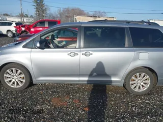 2011 Toyota Sienna XLE AAS with VIN 5TDYK3DC2BS025842, listed as a IAAI auction lot 41721185 with 228,959 mi miles and . Bid and sale history available at DreamBid. Image 14.