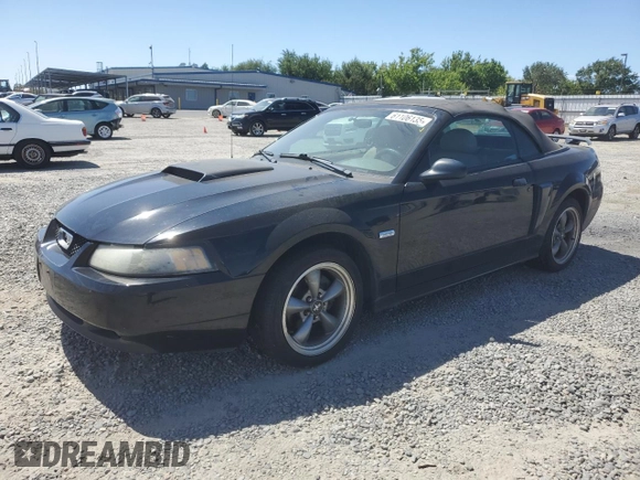 2003 Ford Mustang GT Deluxe z VIN 1FAFP45X23F436939, wystawiony jako Copart lot #61106135 z przebiegiem 105 860 mil mil oraz Czysty tytuł • Clean title. Historia ofert i sprzedaży dostępna na DreamBid. Obrazek 1.