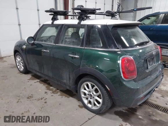 2015 MINI Hardtop 4 Door S z VIN WMWXU3C55FT892293, wystawiony jako IAAI lot #41359066 z przebiegiem 112 704 mil mil oraz . Historia ofert i sprzedaży dostępna na DreamBid. Obrazek 3.
