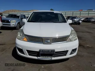2009 Nissan Versa 1.8 S with VIN 3N1BC11E49L371066, listed as a Copart auction lot 57502474 with 157,127 mi miles and Salvage Title. Bid and sale history available at carsss.com. Image 5.