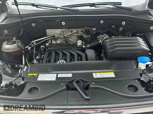 2021 Volkswagen Atlas SE with VIN 1V2WE2CA9MC200518, listed as a Copart auction lot 83644714 with 55,470 mi miles and Clean title. Bid and sale history available at DreamBid. Image 7.