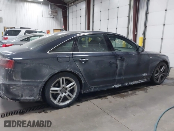 2016 Audi A6 Premium Plus z VIN WAUGFAFCXGN104249, wystawiony jako IAAI lot #41631393 z przebiegiem 117 516 mil mil oraz . Historia ofert i sprzedaży dostępna na DreamBid. Obrazek 13.