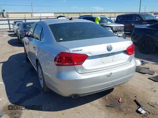 2013 Volkswagen Passat SE w/Sunroof with VIN 1VWBH7A34DC003147, listed as a IAAI auction lot 41662970 with 153,897 mi miles. Bid and sale history available at carsss.com. Image 3.
