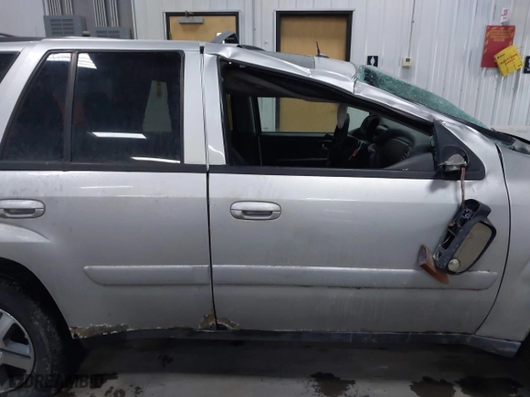 2005 Chevrolet TrailBlazer LT with VIN 1GNDT13SX52357796, listed as a IAAI auction lot 41510963 with 218,766 mi miles. Bid and sale history available at carsss.com. Image 13.