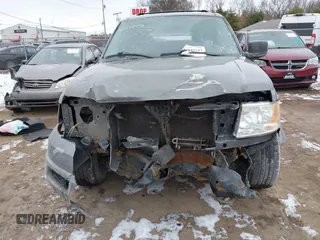 2004 Ford Expedition Special Service with VIN 1FMPU16L74LB40928, listed as a IAAI auction lot 41235243 with 233,942 mi miles. Bid and sale history available at carsss.com. Image 13.