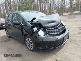2013 Honda Fit Sport with VIN JHMGE8H59DC046377, listed as a IAAI auction lot 41921693 with 89,704 mi miles. Bid and sale history available at carsss.com. Image 1.