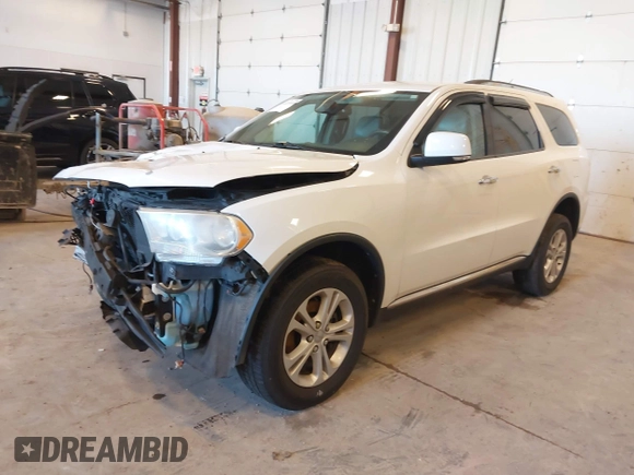 2013 Dodge Durango Crew with VIN 1C4RDHDG5DC553913, listed as a IAAI auction lot 42227189 with 209,703 mi miles and . Bid and sale history available at DreamBid. Image 2.