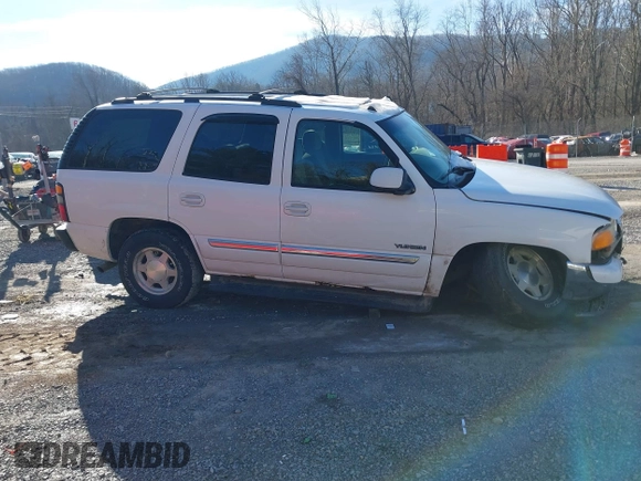 2006 GMC Yukon SLT with VIN 1GKEK13T36R120153, listed as a IAAI auction lot 41592067 with 197,315 mi miles. Bid and sale history available at carsss.com. Image 13.