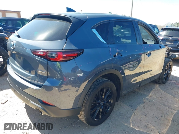 2022 Mazda CX-5 2.5 S Preferred Package with VIN JM3KFBCM8N0584325, listed as a IAAI auction lot 41794012 with 70,182 mi miles. Bid and sale history available at carsss.com. Image 4.