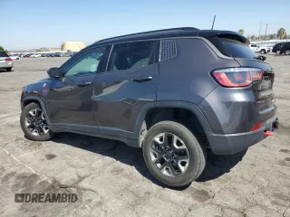 2018 Jeep Compass Trailhawk z VIN 3C4NJDDB0JT130449, wystawiony jako Copart lot #57486015 z przebiegiem 87 318 mil mil oraz Szkoda całkowita • Salvage title. Historia ofert i sprzedaży dostępna na DreamBid. Obrazek 2.