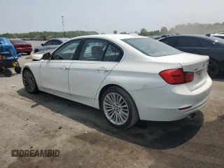 2013 BMW 3 Series 328i xDrive with VIN WBA3B5C55DF592149, listed as a Copart auction lot 59228605 with Not provided miles and Salvage title. Bid and sale history available at DreamBid. Image 2.