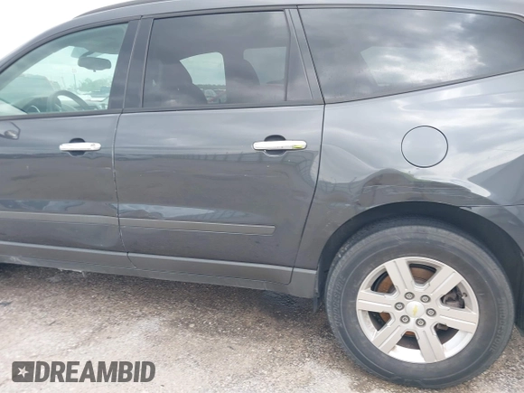 2012 Chevrolet Traverse LS with VIN 1GNKREED5CJ375122, listed as a IAAI auction lot 41993388 with 216,062 mi miles and . Bid and sale history available at DreamBid. Image 6.