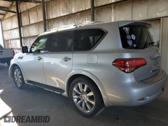 2012 Infiniti QX56 7-passenger with VIN JN8AZ2NF8C9515013, listed as a Copart auction lot 73123884 with 124,300 mi miles and Salvage Title. Bid and sale history available at carsss.com. Image 2.