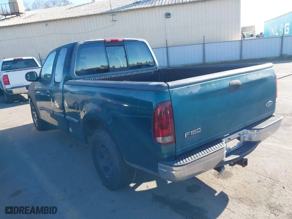 1997 Ford F-150 Standard with VIN 1FTDX1764VKB21915, listed as a IAAI auction lot 41435117 with 147,635 mi miles. Bid and sale history available at carsss.com. Image 3.