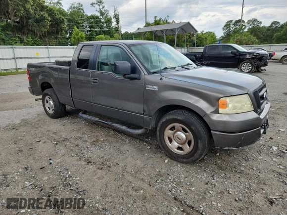 2005 Ford F-150 STX with VIN 1FTRX12W55FB32573, listed as a Copart auction lot 59602715 with 238,701 mi miles and Salvage title. Bid and sale history available at DreamBid. Image 4.
