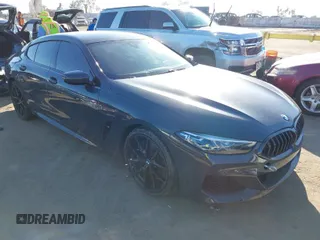 2022 BMW 8 Series M850i with VIN WBAGV8C04NCJ71251, listed as a IAAI auction lot 41657273 with 40,038 mi miles. Bid and sale history available at carsss.com. Image 1.