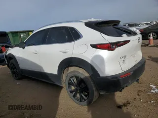 2021 Mazda CX-30 Premium with VIN 3MVDMBDY4MM308677, listed as a Copart auction lot 81869044 with 32,362 mi miles and Salvage Title. Bid and sale history available at carsss.com. Image 2.