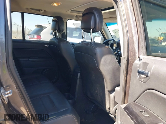 2014 Jeep Patriot Latitude with VIN 1C4NJPFA3ED928123, listed as a IAAI auction lot 41767231 with 136,318 mi miles and . Bid and sale history available at carsss.com. Image 8.